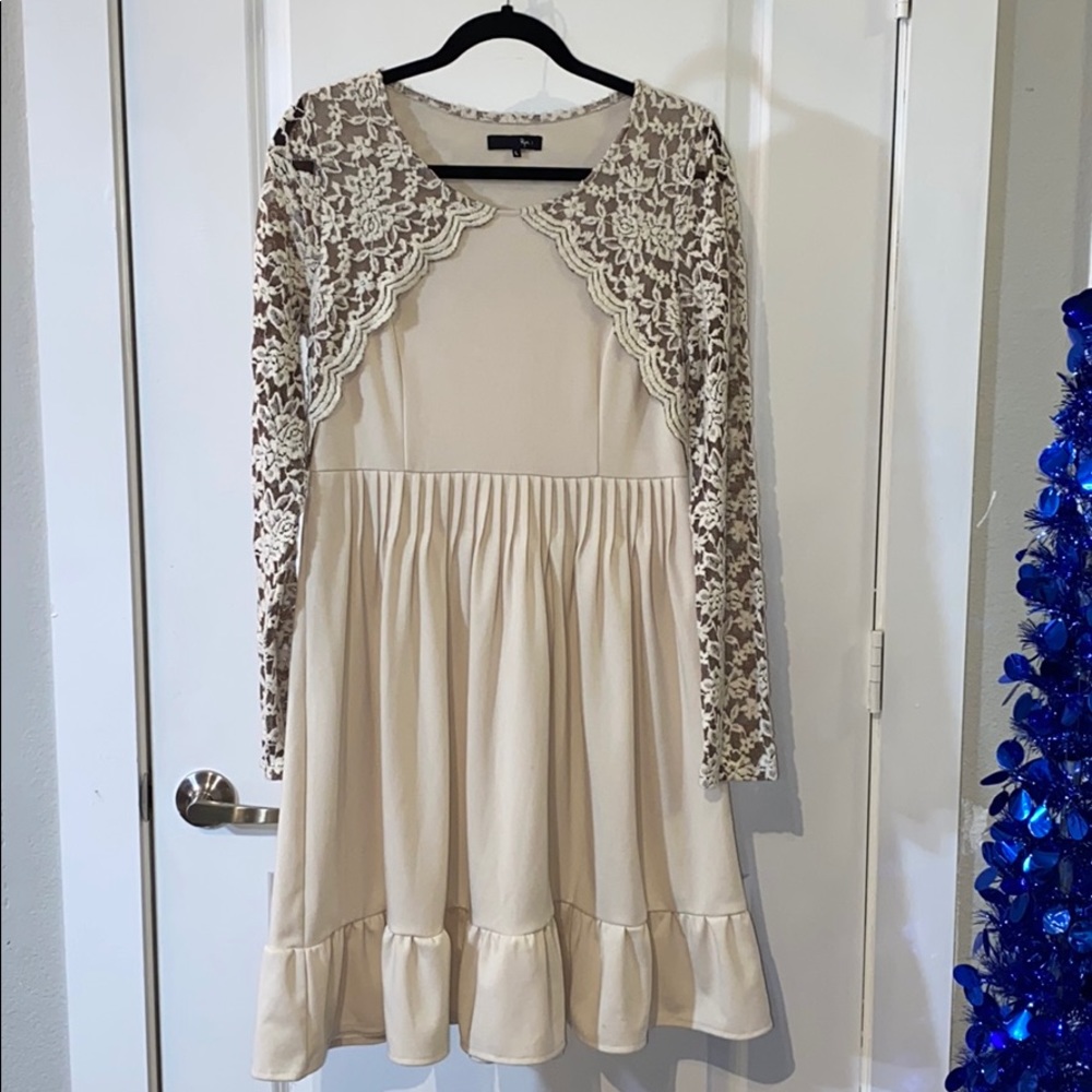 Cream pleated dress with lace sleeves